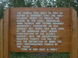 Sign describing quonset hut church